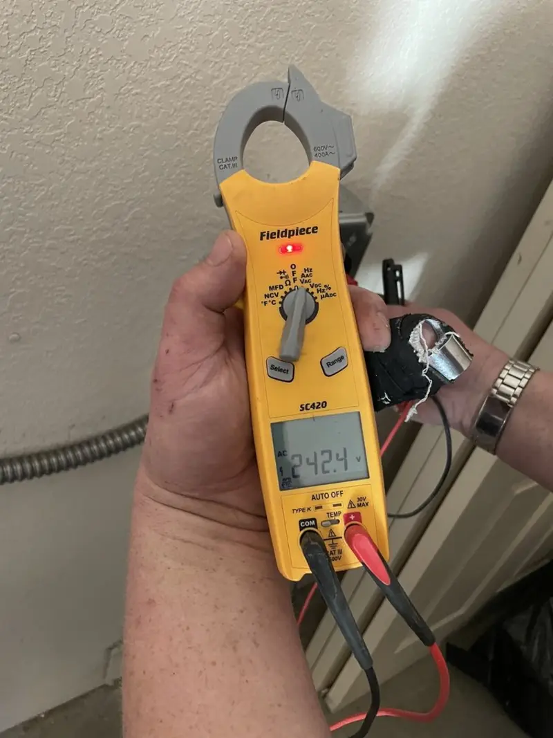Voltage testing with clamp meter during Generator Installation in Maysville
